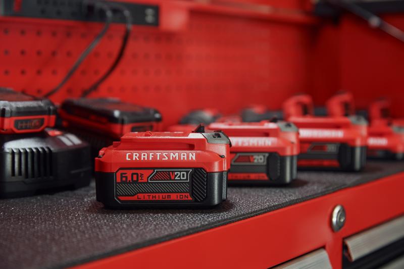 6 amp hour battery sitting on CRAFTSMAN storage