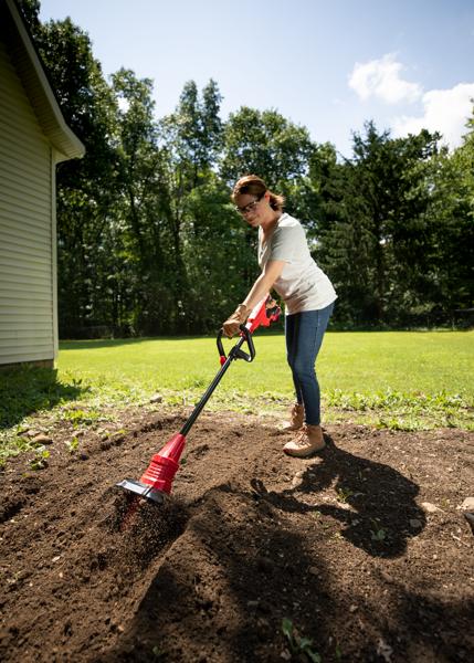 CRAFTSMAN V20 Tiller tilling large garden area near home